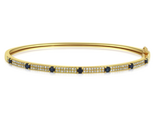 Load image into Gallery viewer, Pavé diamond and sapphire bangle with natural diamonds on white background, showcasing timeless elegance and modern sophistication.
