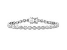 Load image into Gallery viewer, Bezel set pear shaped lab diamond tennis bracelet on white background, showcasing timeless elegance and sustainable luxury.
